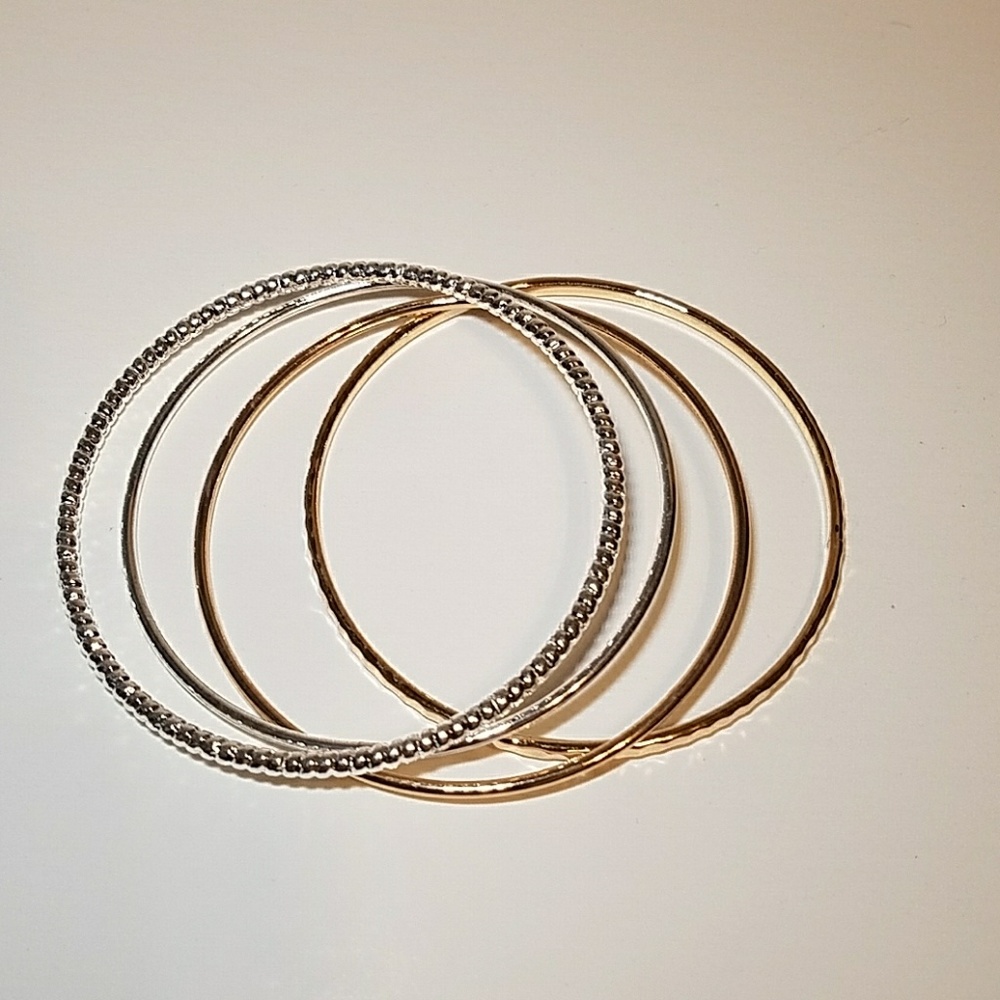 Set of 4 gold and silver bangles